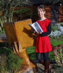 Proudly holding my copy of MORE RAW MATERIAL in the Sunnyside's Memoir Garden